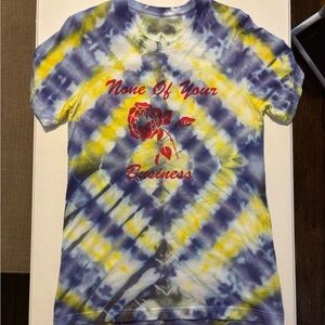 Wildfang Tie-Dye “None of Your Business” Short Sleeve Tee